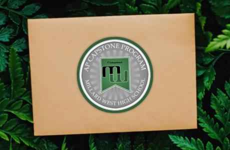 Brown envelope with the millard west logo