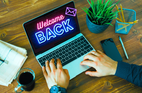 Laptop with “Welcome Back” image