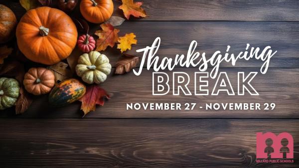 Image of wood table with pumpkins and leaves that says "Thanksgiving Break, November 27-29"