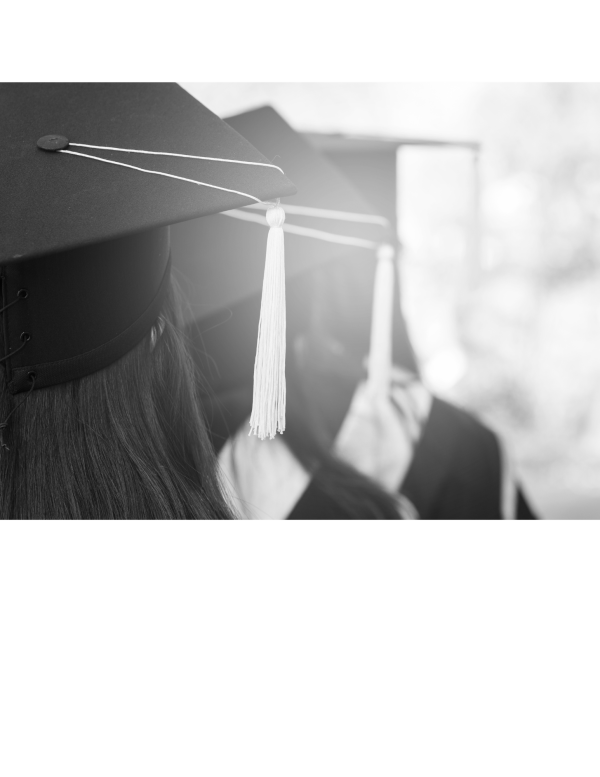 picture of 2 people in cap and gowns walking