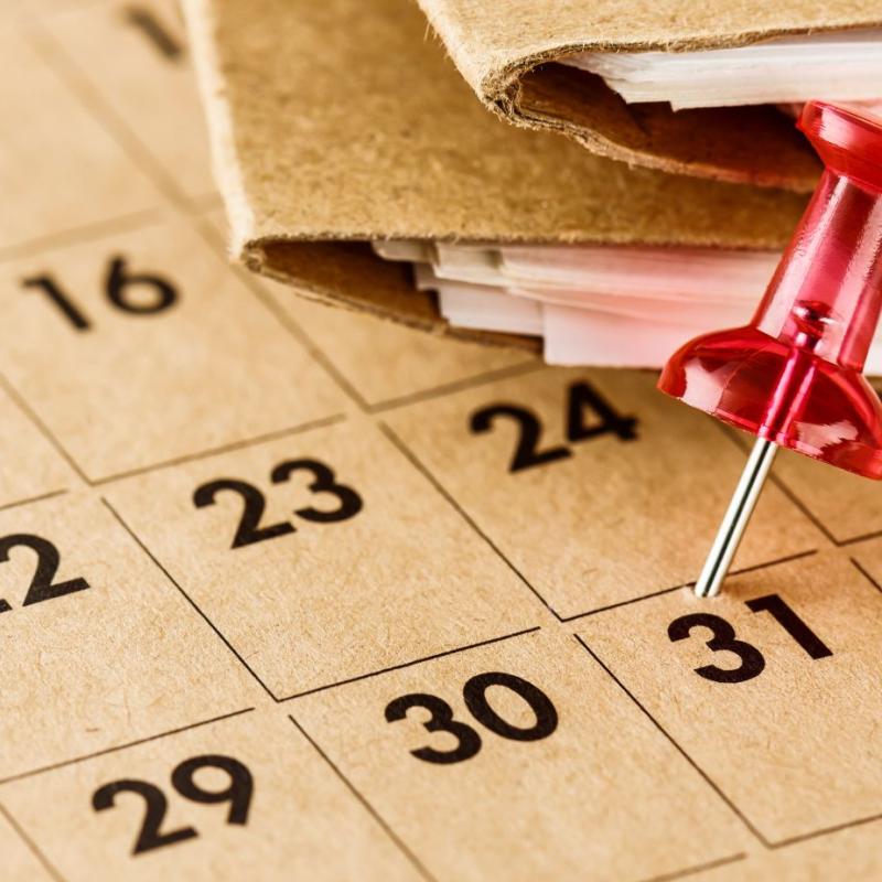 Calendar dates with a red pin in the 31st